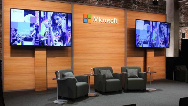 Chairs under a Microsoft logo