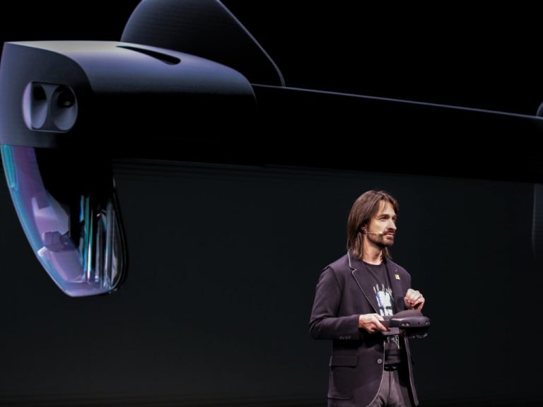 Alex Kipman with HoloLens 2 onstage