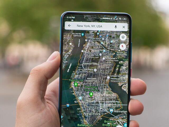 Google maps on a phone in hand